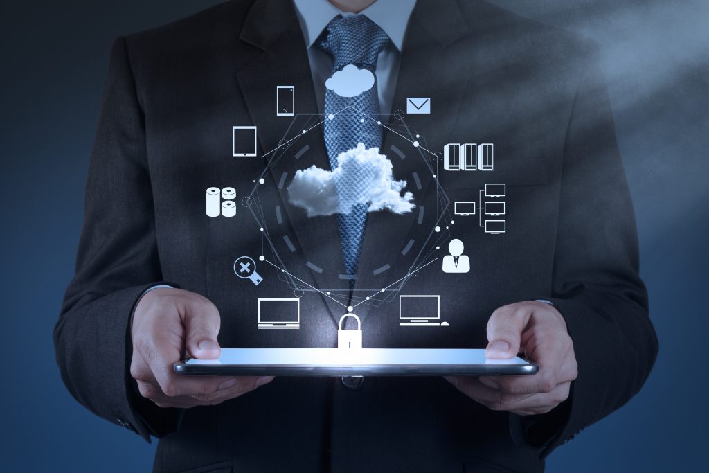 Businessman,Hand,Working,With,A,Cloud,Computing,Diagram,On,The